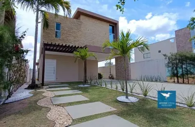 Casa duplex nova na cidade alpha (terras alphaville 02), 215m2, 04 suítes, varandão, paisagismo, lote 335,50m2, 01 quarto/gabinete no piso inferior, dependência de empregada, 04 vagas