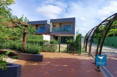 Repasse exclusivo! casa de esquina no giverny condomínio jardim em eusébio. sucesso de vendas! pronto para morar. são 04 suítes, 151m2 de construção, lote 201m2, 03 vagas