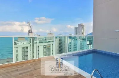 Apartamento alto padrão com sacada envidraçada, 2 dormitórios climatizados sendo 1 suíte, lazer no condomínio na praia das pitangueiras - guarujá/sp