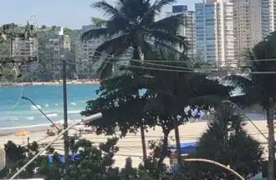 Apartamento com acesso a sacada e vista lateral mar, 2 dormitorios sendo 1 suíte -  pitangueiras-guarujá/sp.