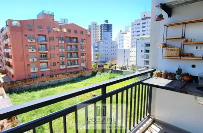 Apartamento com acesso a sacada, 2 dormitórios climatizados sendo 1 suíte, na praia das astúrias-guarujá/sp.