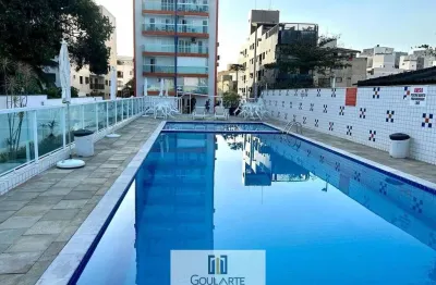 Apartamento alto padrão vista parcial mar, 2 dormitórios climatizados sendo 1 suíte, á menos de 100 metros do mar na praia do tombo-guarujá/sp.