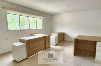 Sala comercial em prédio comercial na pitangueiras - guarujá/sp.