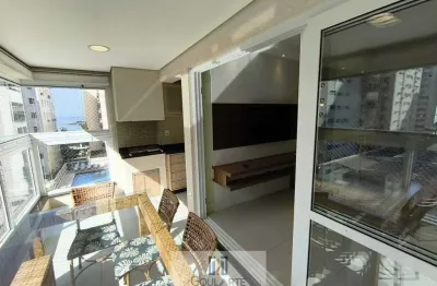 Apartamento alto padrão decorado com acesso a sacada gourmet, 3 dormitórios sendo 1 suíte, lazer no condomínio e vista lateral do mar, na praia das PITANGUEIRAS - Guarujá/SP
