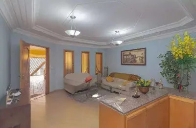 Sobrado Residencial à Venda em Parque Jaçatuba, Santo André – 4 suítes, 4 vagas