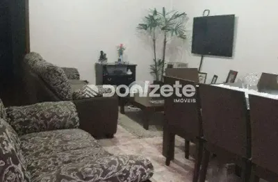 Casa com 4 dormitórios à venda, 275 m² por R$ 957.000,00 - Vila Scarpelli - Santo André/SP