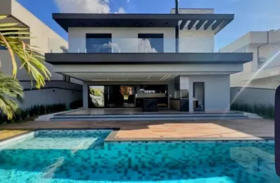 Casa de alto padrão em alphaville dom pedro - campinas-sp: 5 quartos, 5 suítes, 3 salas, 7 banheiros, 4 vagas, 440m² de área.