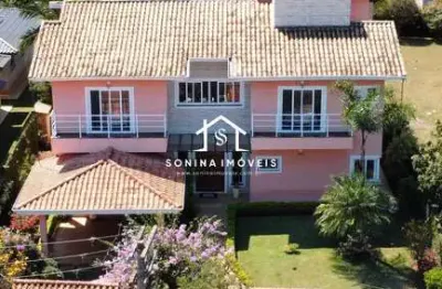Maravilhosa chácara em condomínio 4 suites piscina e muito mais