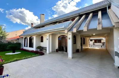 Casa com 4 quartos à venda na ulisses gavazzoni, 44, xaxim, curitiba por r$ 1.790.000