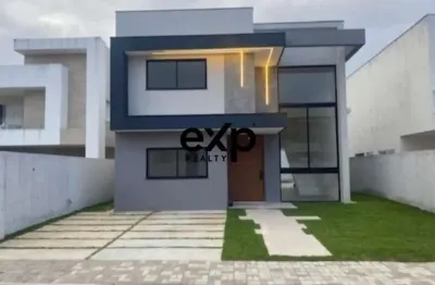 Casa em condomínio fechado com 4 quartos à venda na rua priscila b dutra, 778, buraquinho, lauro de freitas por r$ 2.250.000