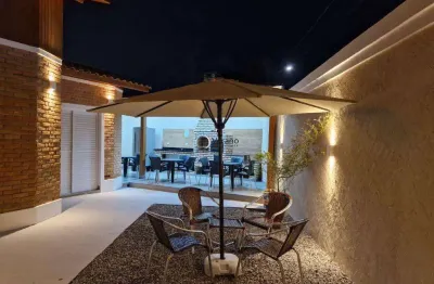 Casa brunella com 130 metros de área construida  a 100 metros da praia