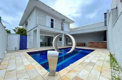 Casa em condomínio com piscina, espaço gourmet, 4 suítes à venda, 300 m² por r$ 1.600.000 - jardim albamar - guarujá/sp