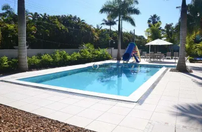 Casa a venda no Jardim Acapulco com 6 suítes, piscina, espaço gourmet, quadra de tênis e sauna - Guarujá/SP