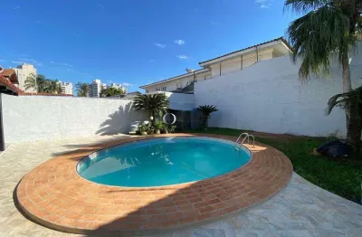 Casa com 4 dormitórios à venda, 247 m² por r$ 990.000,00 - jardim virginia - guarujá/sp