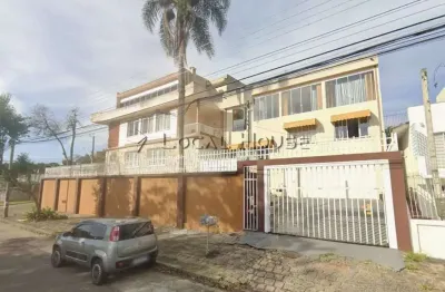 Casa residencial e comercial à venda no hugo lange – 3 pavimentos, vista panorâmica e espaços amplos.