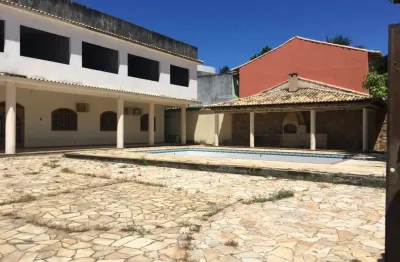 Terreno de 750 m2 com casa inacabada, 13 quartos, braga, cabo frio, rj