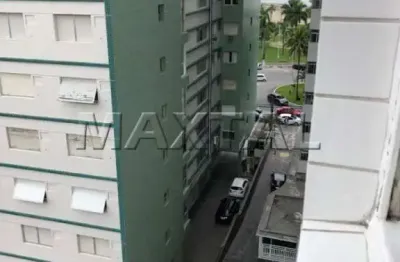 Apartamento em são vicente com dois dormitórios, sala para dois ambientes , cozinha e vaga.
