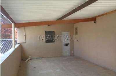 Terreno com 4 casas alugadas, com 330m², terreno em declive, 15,50 m de frente.