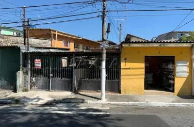 Terreno à venda com 3 casas mais uma loja ao nível da rua, na vila dionísia.