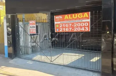 Loja para locação com salão amplo, copa cozinha, 2 banheiros e 2 vagas na avenida parada pinto.
