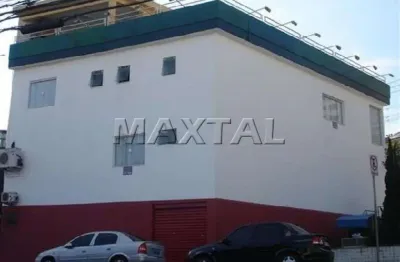 Imovel comercial com 350m², com 8 salas, 6 banheiros e 4 vagas de garagem.