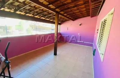 Casa com 4 quartos sendo 1 suite  2 sala vaga pra 4 carro com churrasqueira e fogão a lenha.