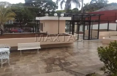 Apartamento à venda de 74m², 2 dormitórios, sala, cozinha, área de serviço, 2 banheiros e 1 vaga.