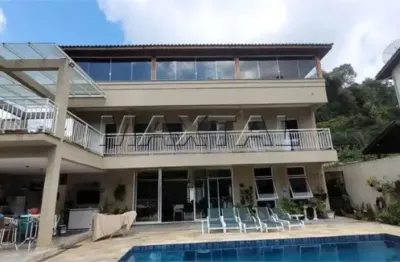 Sobrado em condomínio fechado em mairiporã, com 3 suítes, cozinha, área, piscina e 2 vagas.