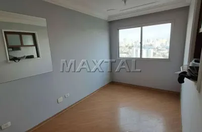 Apartamento à venda com 65m², 2 dormitórios com armários, sala, cozinha planejada e 1 vaga.