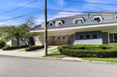 Casa alphavile de 1531,24 m², 7 quartos e 7 suites, salas, lareira, cozinha, elevador e 5 vagas.