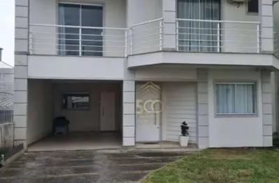 Casa 04 dormitórios com 04 vagas de garagem, vista mar á venda no bairro barreiros - na cidade de são josé - sc.