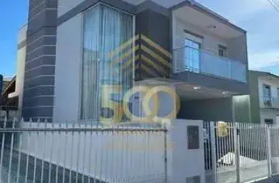 Residencial › casa com 3 dormitório(s) sendo 1 suíte(s) no bairro praia comprida - - são josé - sc