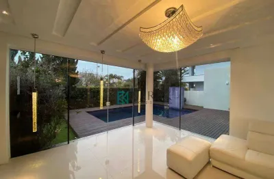 Casa com 4 dormitórios à venda, 588 m² por r$ 5.600.000,00 - jurerê internacional - florianópolis/sc