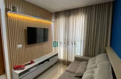 Apartamento á venda - 2 quartos, semi mobiliado, 2 vagas de garagem cobertas.