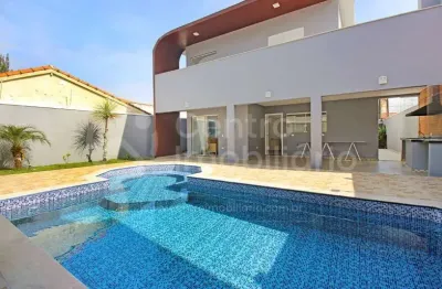 Casa à venda com piscina e 4 quartos em peruíbe, no bairro balneario arpoador