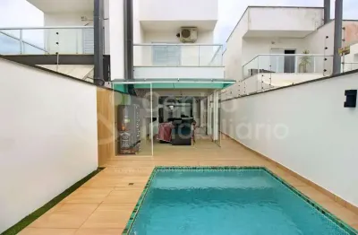 Casa à venda com piscina e 3 quartos em peruíbe, no bairro centro