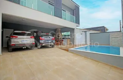 Casa à venda com piscina e 3 quartos em peruíbe, no bairro jardim três marias