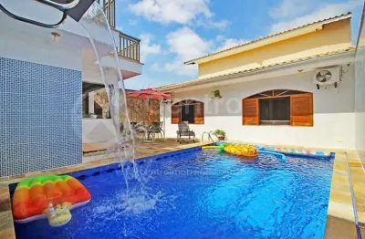 Casa à venda com piscina e 4 quartos em peruíbe, no bairro stella maris