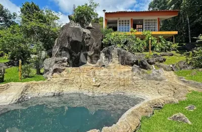 Casa à venda com piscina e 4 quartos em peruíbe, no bairro guarau