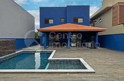 Casa à venda com piscina e 4 quartos em peruíbe, no bairro residencial bosque três marias