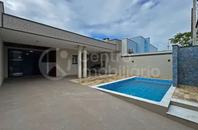 Casa à venda com piscina e 3 quartos em peruíbe, no bairro estancia sao jose