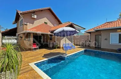 Casa à venda com piscina e 4 quartos em peruíbe, no bairro jardim três marias