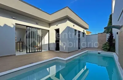 Casa à venda com piscina e 3 quartos em peruíbe, no bairro jardim três marias