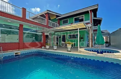 Casa à venda com piscina e 4 quartos em peruíbe, no bairro stella maris