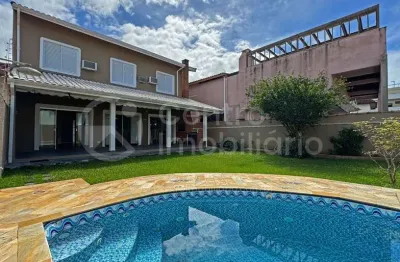 Casa à venda com piscina e 3 quartos em peruíbe, no bairro jardim ribamar