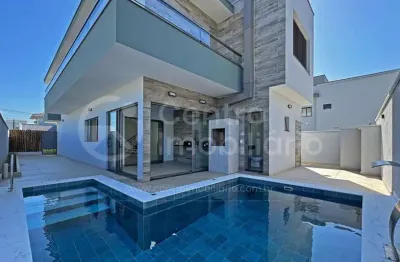 Casa à venda com piscina e 4 quartos em peruíbe, no bairro bougainvillee iv