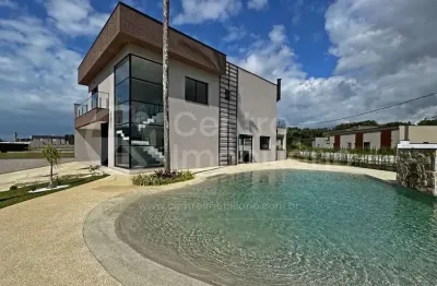 Casa à venda com piscina e 4 quartos em peruíbe, no bairro residencial bosque três marias