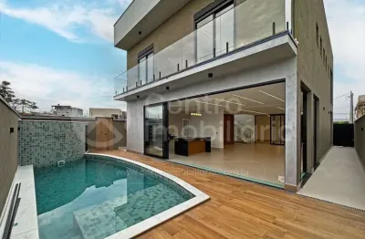 Casa à venda com piscina e 3 quartos em peruíbe, no bairro residencial flora rica