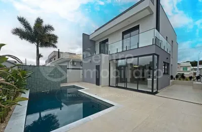 Casa à venda com piscina e 4 quartos em peruíbe, no bairro bougainvillee iv