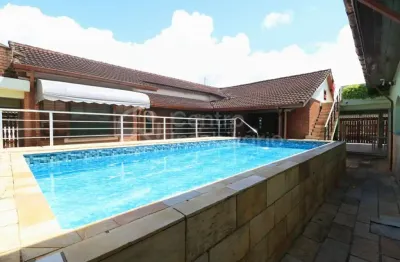 Casa à venda com piscina e 4 quartos em peruíbe, no bairro estancia sao jose